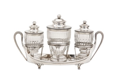 Lot 4 - A George III sterling silver cruet set, London...