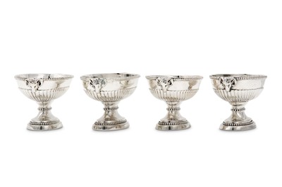 Lot 63 - A set of four George III sterling silver salts,...
