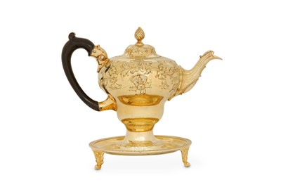Lot 127 - A George III sterling silver-gilt teapot,...