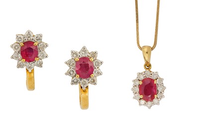 Lot 104 - A ruby and diamond pendant necklace and a pair...