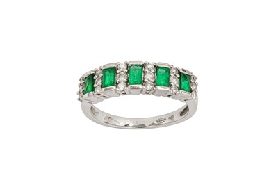 Lot 80 - An emerald and diamond ring Set with five...