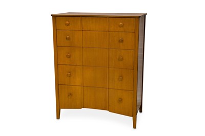 Lot 345 - A 1950s Heal's birch inverted bowfront chest...