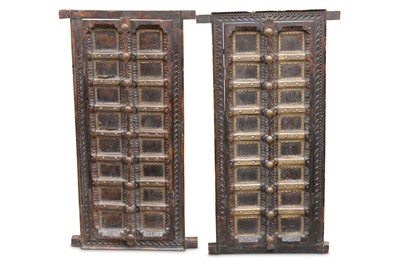 Lot 485 - Two pairs of Indian Rajasthani carved wooden...