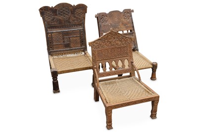 Lot 487 - A group of three Indian low chairs and a...