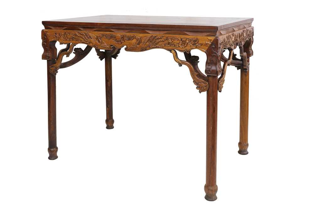 Lot 291 - A CHINESE HUALI TABLE. 20th Century.  The...