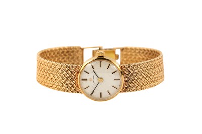 Lot 93 - OMEGA. A 9K YELLOW GOLD LADIES MANUAL BRACELET...