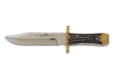 Lot 102 - A Reg Cooper Sheffield Bowie knife with 18.5cm...