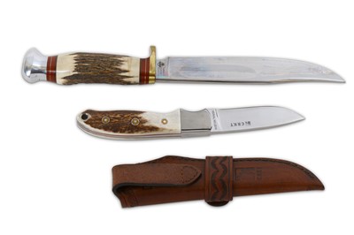 Lot 106 - Two modern hunting knives, comprising: 1)...