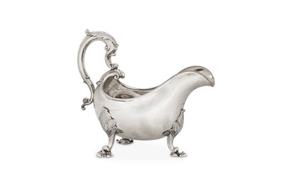 Lot 6 - A George II sterling silver sauceboat, London...