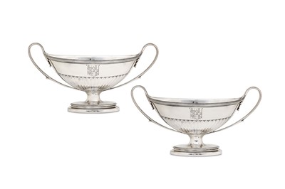 Lot 31 - A pair of George III sterling silver twin...