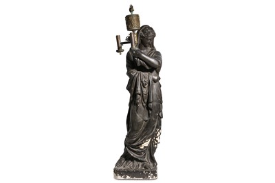 Lot 249 - A REGENCY 'BRONZED' PLASTER FEMALE TORCHERE...