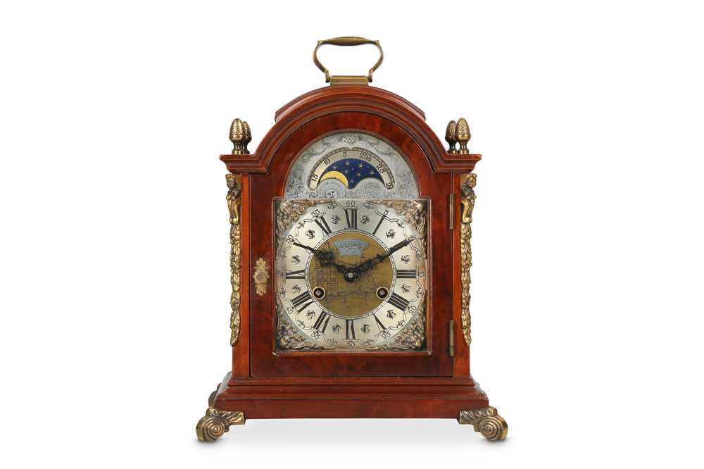 Lot 35 - A GEORGE III STYLE MAHOGANY AND BRASS MOUNTED...