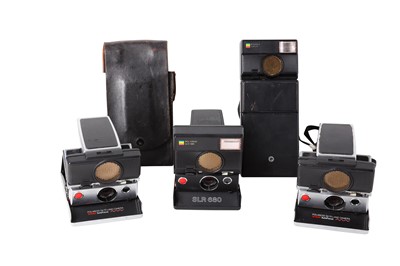 Lot 971 - Polaroid SLR Cameras examples include; chrome...