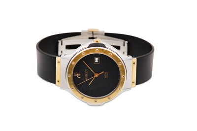 Lot 84 - HUBLOT. A LADIES STAINLESS STEEL AND GOLD...