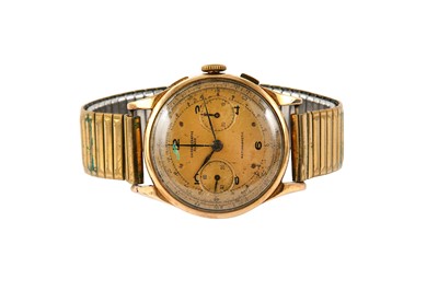 Lot 100 - AN 18K GOLD GENTS MANUAL CHRONOGRAPH...