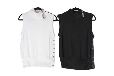 Lot 33 - Two Burberry Knitted Tops, the first cream,...