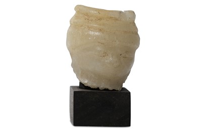 Lot 4 - AN EGYPTIAN CALCITE FACE Middle Kingdom, 12th...