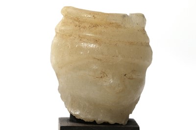 Lot 4 - AN EGYPTIAN CALCITE FACE Middle Kingdom, 12th...