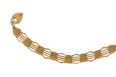 Lot 140 - A gold bracelet The 18 carat gold gate-link...