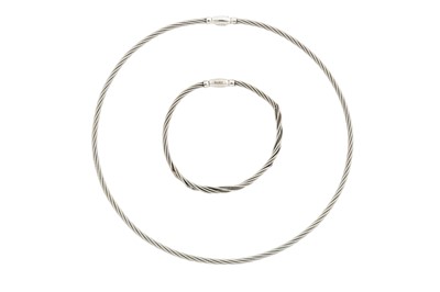 Lot 81 - A white gold bracelet and necklace suite, by...