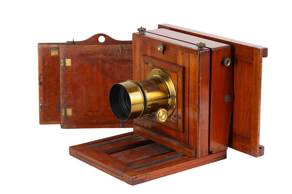 Lot 133 - A Whole Plate Mahogany Studio Camera with...