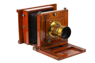 Lot 133 - A Whole Plate Mahogany Studio Camera with...