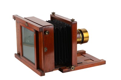 Lot 133 - A Whole Plate Mahogany Studio Camera with...