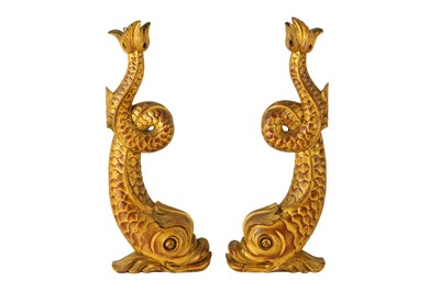Lot 220 - A pair of 20th Century giltwood dolphins, each...