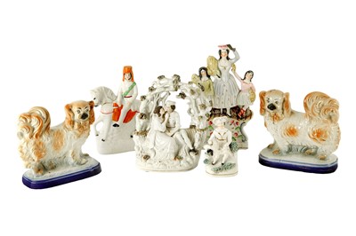 Lot 48 - A collection of six Staffordshire figures to...