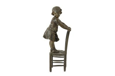 Lot 156 - A French bronzed spelter figure of a girl...