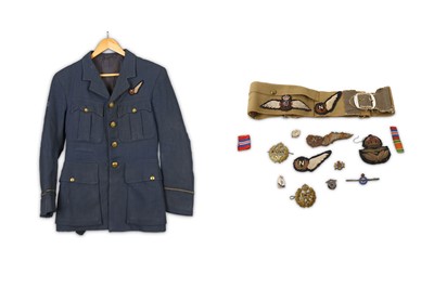 Lot 180 - The RAF jacket, badges and insignia of...