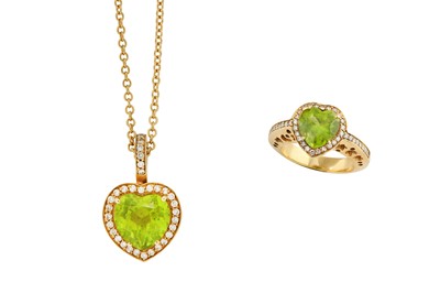 Lot 68 - A peridot and diamond ring and pendant...