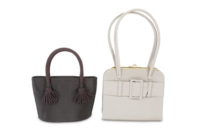 Lot 95 - Two Anya Hindmarch Mini Handbags, one in dark...
