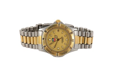 Lot 103 - TAG HEUER. A STAINLESS STEEL AND GOLD PLATED...