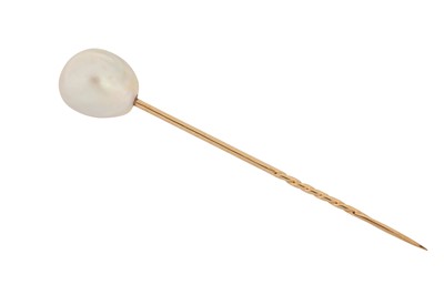 Lot 96 - A natural pearl stickpin  The 11.5-12.5x14.1mm...