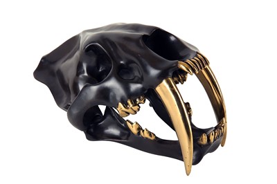 Lot 123 - A sabre tooth tiger skull, cast in bronze,...