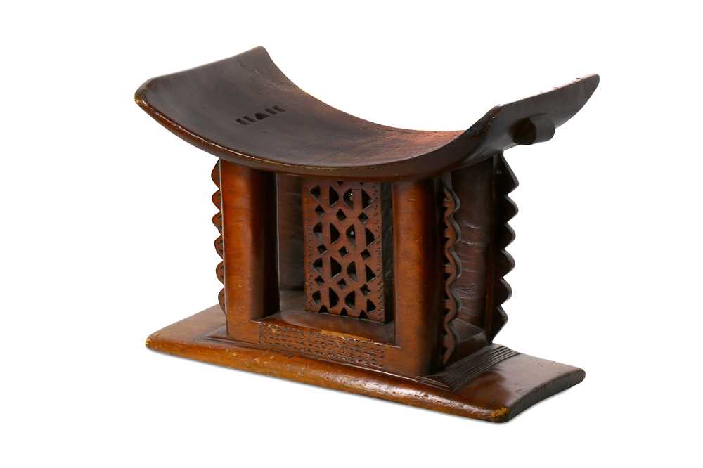 Lot 162 - AN ASHANTI STOOL, GHANA With a shallow 'U'...