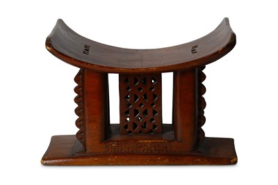 Lot 162 - AN ASHANTI STOOL, GHANA With a shallow 'U'...