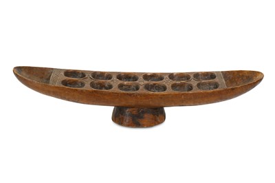 Lot 163 - A WEST AFRICAN BOAT SHAPED GAME BOARD For...