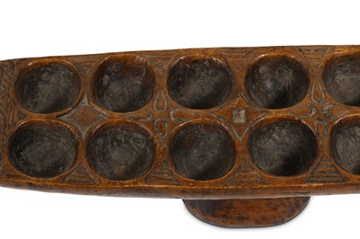 Lot 163 - A WEST AFRICAN BOAT SHAPED GAME BOARD For...