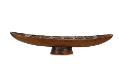 Lot 163 - A WEST AFRICAN BOAT SHAPED GAME BOARD For...