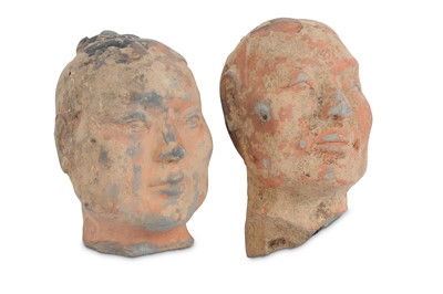 Lot 943 - TWO CHINESE POTTERY HEADS. Han Dynasty. Both...