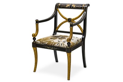 Lot 360 - An Empire style ebonised open armchair,...