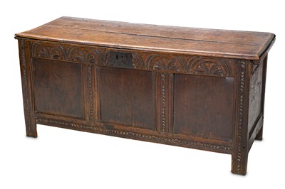 Lot 247 - A 17th Century oak coffer, with a plank top,...