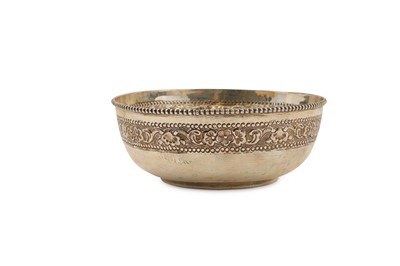 Lot 95 - An Indian silver lobed bowl with repousse...
