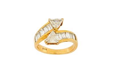 Lot 190 - A diamond crossover ring Each terminal set...