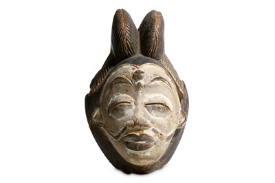 Lot 179 - A PAINTED PUNU MASK, GABON  The mask covered...