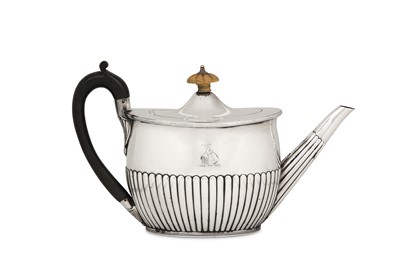 Lot 29 - A George III sterling silver teapot, London...