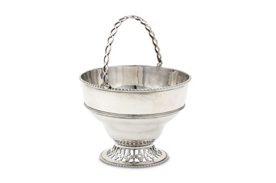 Lot 45 - A George III sterling silver sugar basket,...